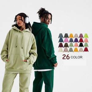 Vente en gros de sweats à capuche unisexes amples, derniers modèles d'automne et d'hiver en polaire pour hommes et femmes - Product Image 1