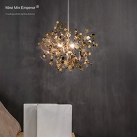 Lustre en acier inoxydable de style postmoderne et luxueux, design modulaire de style nordique, éclairage suspendu personnalisable pour restaurants
