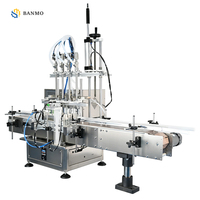 Machine de remplissage automatique BANMO à 4 têtes avec pompe magnétique et convoyeur, capacité de remplissage de liquides de 5 à 2000 ml, haute précision