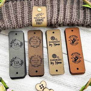 Suéteres y gorros transfronterizos de otoño e invierno, etiquetas de cuero personalizadas DIY, etiquetas de cuero PU con logo grabado a láser, a la moda - Product Image 1