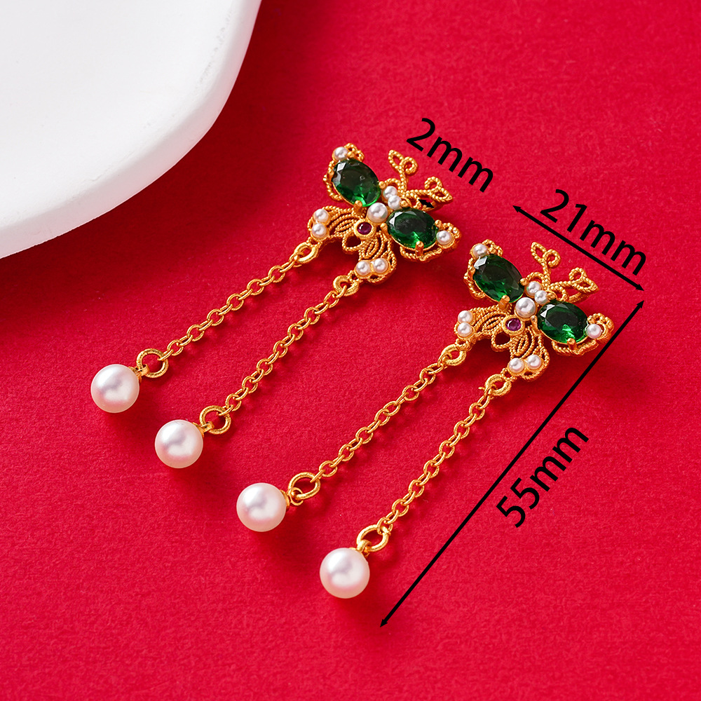 Papillon double pompon perle verte