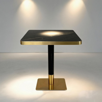 Table de bistrot élégante avec plateau en marbre noir et bordure dorée, pour restaurant, café, hôtel, vente en gros, directement de l'usine, sur mesure