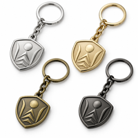 Porte-clés en métal personnalisé sur mesure avec logo géométrique, vente en gros directe d'usine, cadeau OEM, fabricant de porte-clés en métal