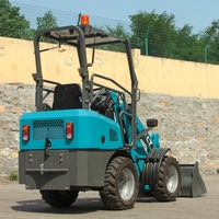 Machine agricole longue durée 600kg 0.6 tonnes mini tracteur électrique à chargeuse sur pneus avant avec certification CE pour une utilisation en extérieur
