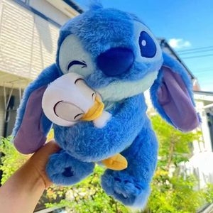 Peluches de Donald Duck <span class=keywords><strong>y</strong></span> Stitch de <span class=keywords><strong>Lilo</strong></span> & Stitch, con Peluche Corto <span class=keywords><strong>y</strong></span> Suave Ecológico de 20cm-30cm, Regalo de Cumpleaños para Niños Unisex - Product Image 1