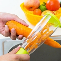 Fruit- en groenteschiller met opbergdoos