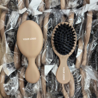 Brosse à cheveux compacte personnalisée avec logo, mini brosse démêlante en poils de sanglier vierges avec étui en coton