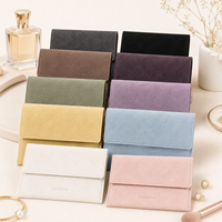 Pochette en daim avec rabat et bouton pression pour bijoux, cosmétiques, accessoires de voyage, emballage cadeau, rangement