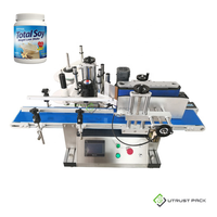Machine d'étiquetage adhésive pour bouteilles rondes, table de convoyage, applicateur d'étiquettes pour bouteilles de cosmétiques