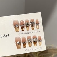 Faux ongles à presser personnalisés faits main de luxe, couleur nude marron, style French Cat Eye, avec strass papillon 3D