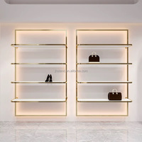 Idées de présentation de sacs à main tendance, design d'intérieur de boutique, présentoir mural pour chaussures, stand à chaussures pour femmes, boutique