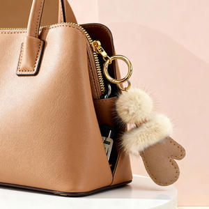 Porte-clés en cuir PU artisanal tendance, écologique, charme mignon, cadeau promotionnel - Product Image 1