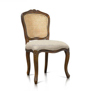 Chaise d'appoint en bois massif de style français, avec un siège rembourré foncé alliant charme classique et confort moderne - Product Image 1