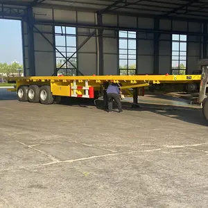 Nhà máy tiện ích xe 3 trục 20 ft 40 feet tự loader container Trailer Side nâng lên Nâng Container Skeleton Trailer bán