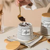 Vente en gros de pots de stockage en céramique blanche personnalisés en forme de cône pour boîte à café, sucre, thé, couvercles de pots à biscuits pour rangements à domicile