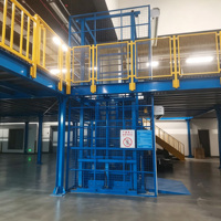 Monte-charge hydraulique vertical fixe pour charges lourdes, idéal pour l'entrepôt et le levage de marchandises