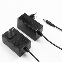 Adaptateur d'alimentation AC/DC 24W 12V 2A avec chargeur mural interchangeable pour appareils électriques et équipements électroniques