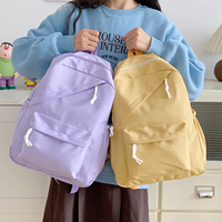 Sac à dos scolaire personnalisé de couleur unie, imperméable, grande capacité, décontracté, pour le sport, les sorties quotidiennes des adolescentes et les voyages universitaires