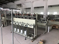 Machine à doubler les fils / Machine à retordre deux fils à la fois / T.F.O