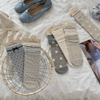 Packs personnalisés de chaussettes mi-mollet en coton à pois avec revers à volants pour femmes