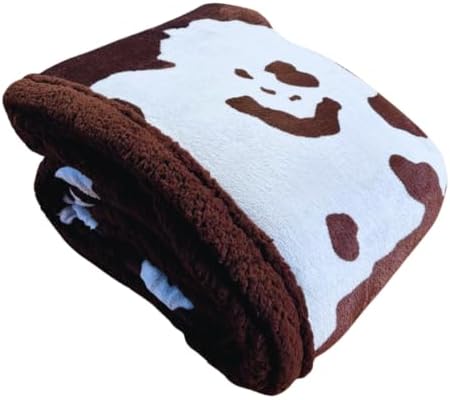 Vache marron et blanche