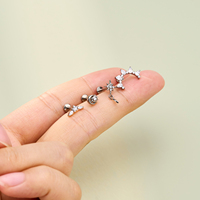 Piercing d'oreille en titane ASTM F136 à filetage interne avec zircone cubique (CZ) en forme d'étoile, de lune, de croix ou de fleur pour tragus, hélix et cartilage
