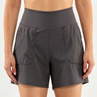 Shorts pour femmes à taille mi-haute avec poches, pantalons courts décontractés et sportifs pour l'entraînement, les sports et les activités de plein air