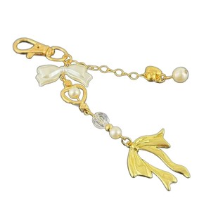 LLavero <span class=keywords><strong>de</strong></span> aleación <span class=keywords><strong>de</strong></span> moda para niñas Y2K lindo lazo abierto para amor arco colgante bolsa encanto colgante decoración y regalo - Product Image 1