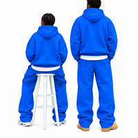 Ensemble survêtement streetwear homme personnalisé, comprenant un sweat à capuche zippé épais et un pantalon de survêtement oversize à jambes larges