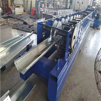 Gouttières rondes de petit prix usine faisant former la machine portative de tuyau de descente de gouttière et de rouleau de coude de pluie