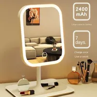Miroir de maquillage de bureau à commande tactile LED tricolore unique et design pour chambre à coucher