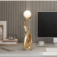 Figurine en résine sculptée d'art abstrait moderne avec forme irrégulière pour la décoration de la maison, veilleuse