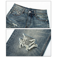 Celana Denim Gaya Retro Amerika dengan Efek Usang dan Tambalan Jahitan Tangan - Celana Pria dan Wanita yang Tahan Lama.