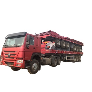 รถพ่วงบรรทุกสินค้าแบบพื้นเรียบเหล็ก 5 ตู้คอนเทนเนอร์ ขนาด 60 ตัน สำหรับแอฟริกา ZF-Trailer 12500x2500x1550 มม. - Product Image 1