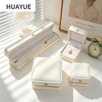 Coffret de luxe Huayue personnalisé en cuir PU blanc à coins arrondis pour bijoux