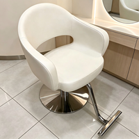 Fauteuil de salon moderne à accoudoirs creux, chaise de coiffure hydraulique avec repose-pieds