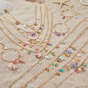 Joyería de Verano Estilo Bohemio para Chicas de Playa y Océano Collar y Pulsera con Dijes de Conchas y Estrellas de Mar de Acero Inoxidable en Colores de Ensueño - Product Image 3
