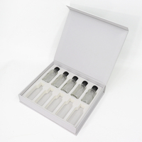 Boîte de tiroir magnétique double couche en carton rigide écologique avec insert en mousse EVA pour emballage de collection de soins de la peau bouteille en verre