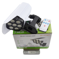 Lampe murale extérieure de lumières de secours solaires avec le projecteur de capteur de mouvement et la fonction de sécurité factice de caméra factice de simulation