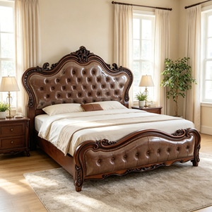 Victorian King Size Leather Upholstered Bed with Tufted Headboard and Carved Wood Frame - Product Image 1