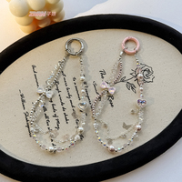 Porte-clés de luxe torsadé à double couche avec perles et breloque de sac à main en perles de cristal