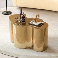 Table basse en acier inoxydable doré de luxe de haute qualité Table d'appoint centrale de forme unique pour la maison hôtel meubles de salon