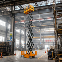 Plateforme élévatrice à ciseaux électrique sur chenilles en acier de 14 m GS1212TL, capacité 450 kg, avec extension de 900 mm pour la construction industrielle