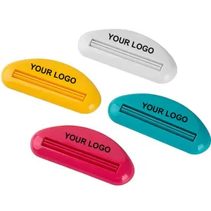 Logo kustom praktis mendorong penyimpanan pasta gigi plastik tabung pemeras untuk Dispenser pasta gigi kecantikan Promo hadiah barang