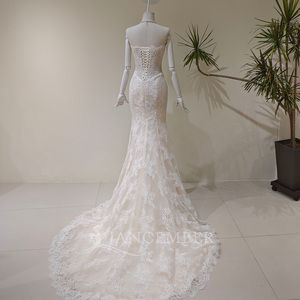 LY129 Robe de mariée sirène moderne avec appliques florales en cristal, broderies, col bateau, sans manches, motif en dentelle et traîne chapelle - Product Image 4
