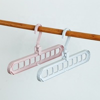 Cintres magiques à 9 trous pliables, organisateur de placard en plastique peu encombrant avec crochet, support de suspension pour linge pour armoire, dortoir et voyage
