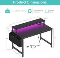 Bureau de jeu réversible OEM en forme de L avec éclairage LED, prises de courant, étagères de rangement, structure métallique, table d'ordinateur d'angle
