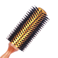 Brosse à cheveux hybride en nylon sanglier avec logo personnalisé pour démêler la palette ronde de style manche en bois à double poils flexible pour le séchage par soufflage