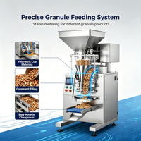Machine d'emballage verticale entièrement automatique pour noix, remplisseuse et scelleuse de petits sachets de granulés pour amandes, noix de cajou, cacahuètes et autres snacks