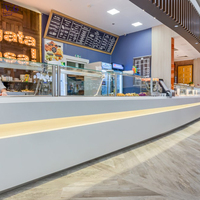 Comptoir de réception et de caisse de restaurant moderne et luxueux sur mesure avec surface solide pour hôtel et aire de restauration